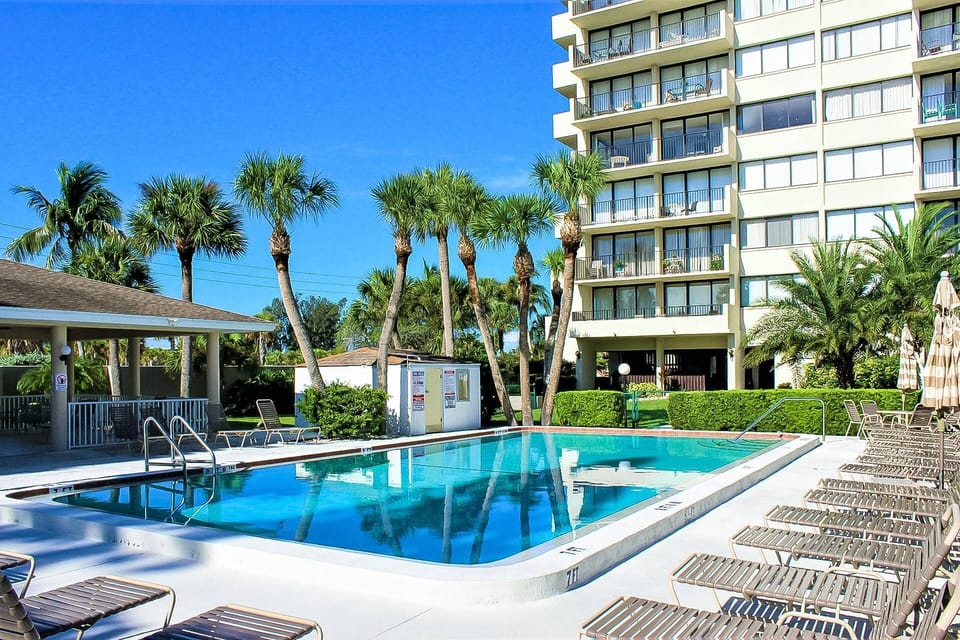Our House at the Beach heated complex pool.  Beach/pool towels provided in the townhome