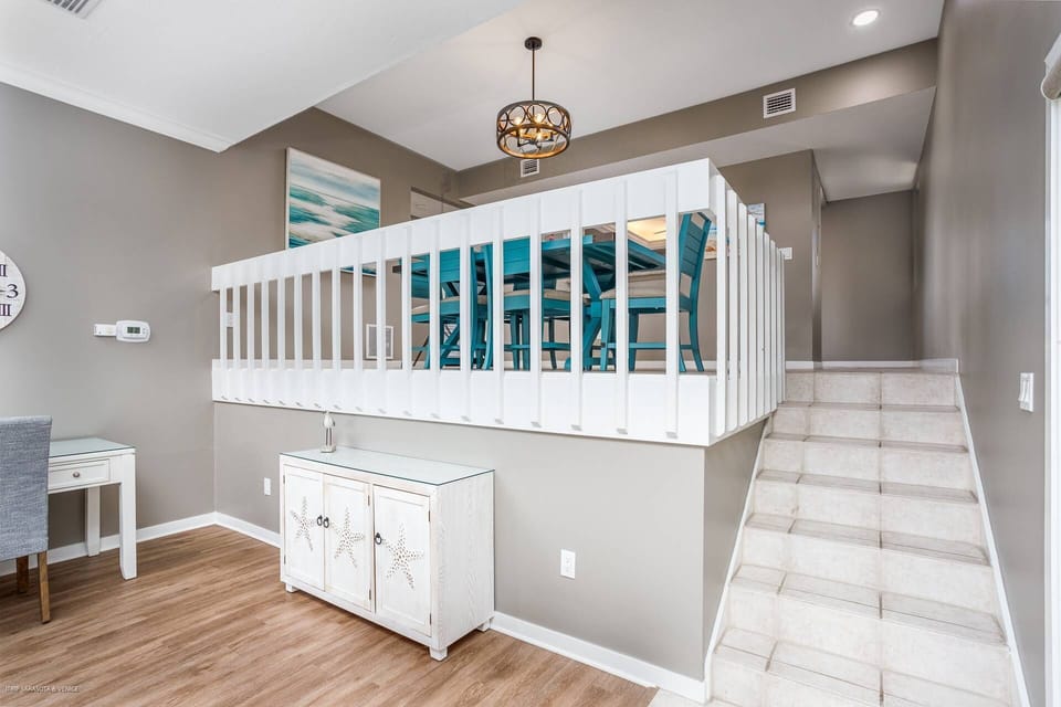 Half stairs to the kitchen and dining room.