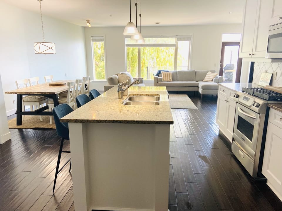 Open plan living area with lake view