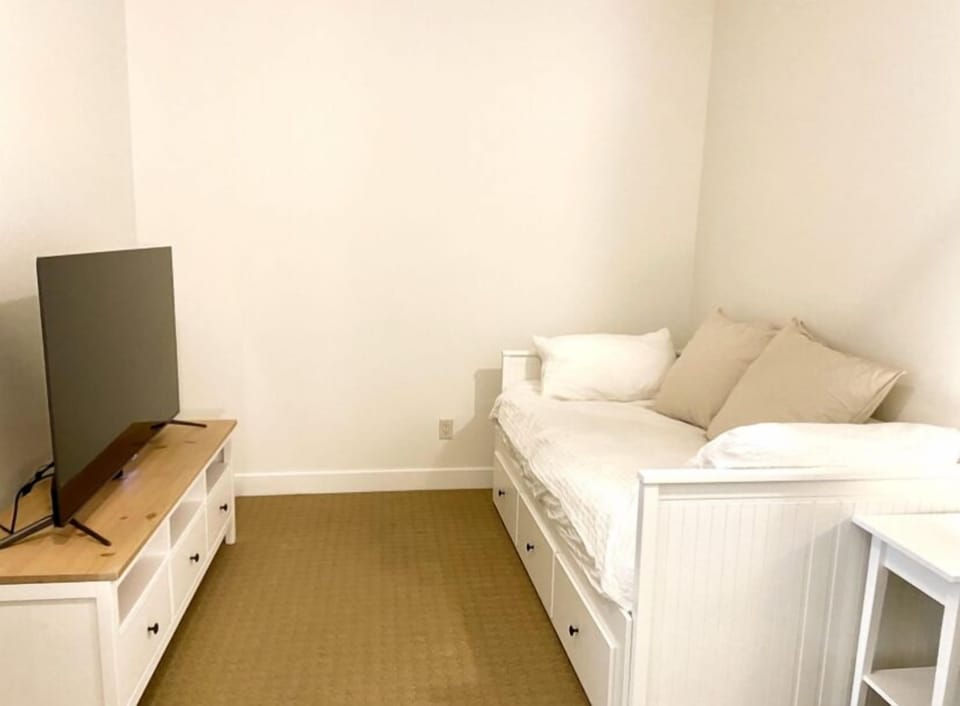 Den area upstairs with day bed that pulls out into a king bed if needed