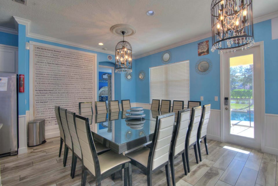 Elegant dining room with seating for 14, perfect for large gatherings and celebrations.