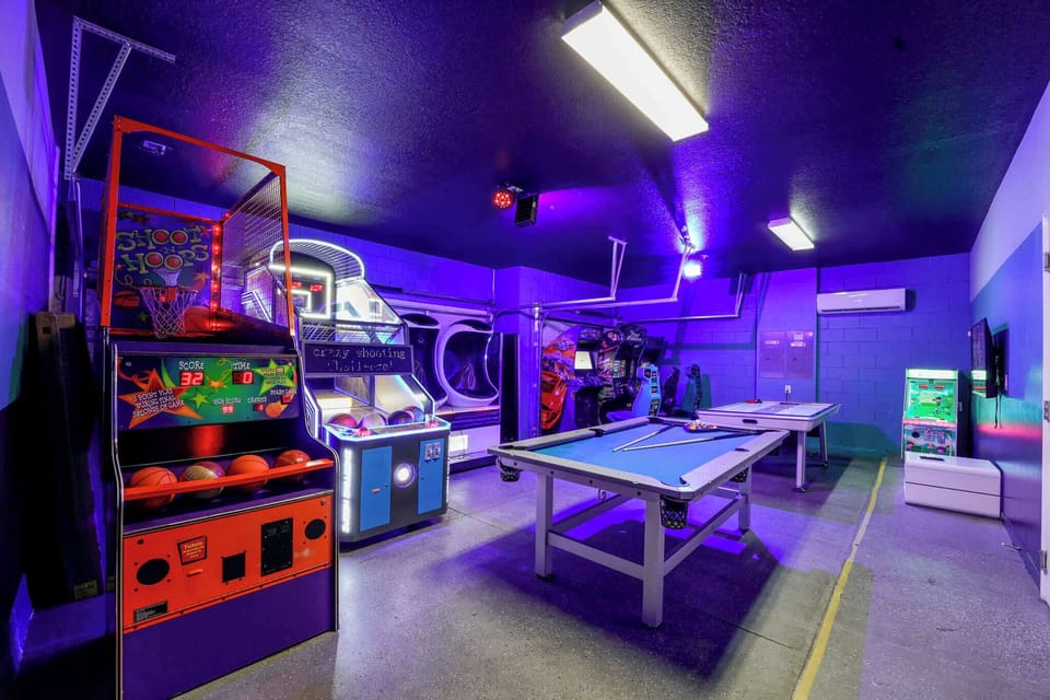 Experience endless fun in the vibrant game room, featuring arcade games, a pool table, and more for unforgettable entertainment.
