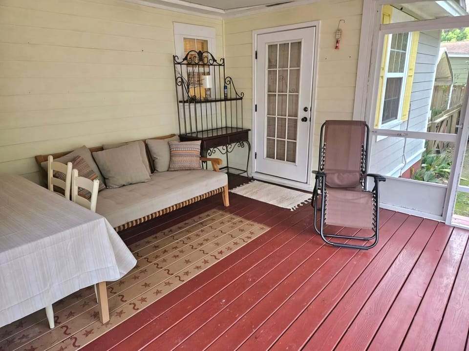 Sleeping screened in back porch  walks out to a sparkling enclosed pool