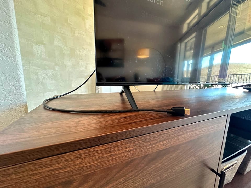 Guest HDMI available to connect your devices to the 65" 4K TV.