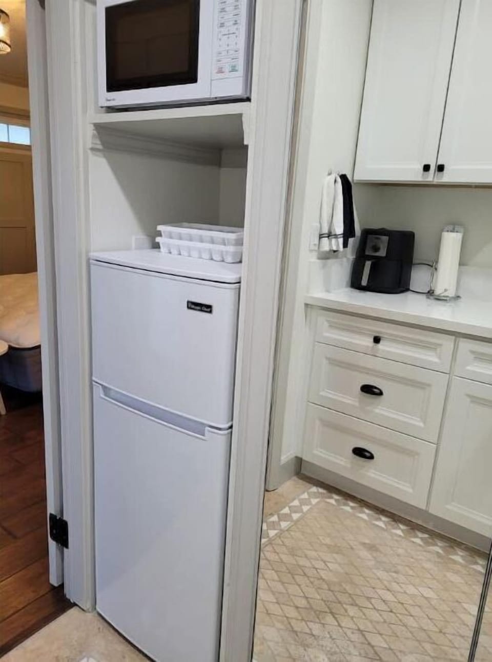 Refrigerator and microwave in kitchenette