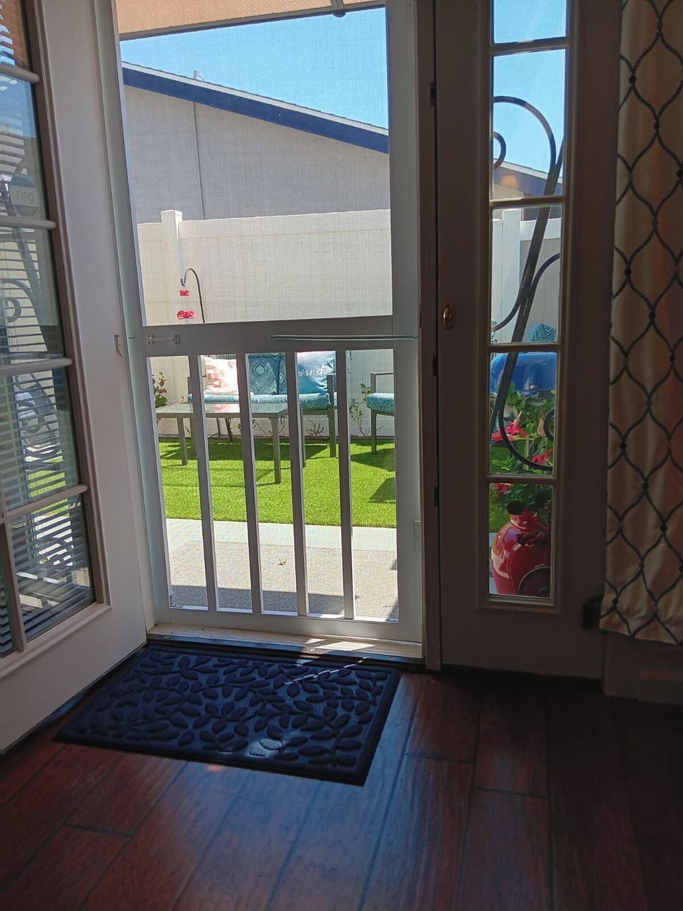View from French doors into private yard for Suite B