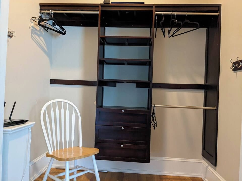 2 massive closets border the bedroom - chair is there for scale.