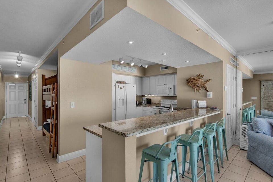 Kitchen and bar with stools