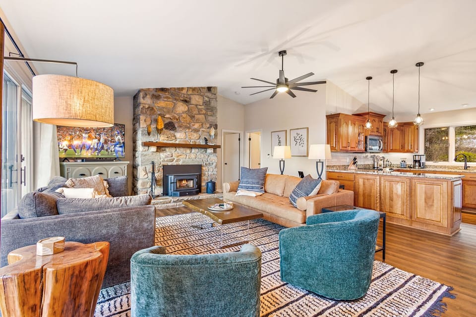 Charming Upscale Living with a Wood Burning Fireplace in the Living Room