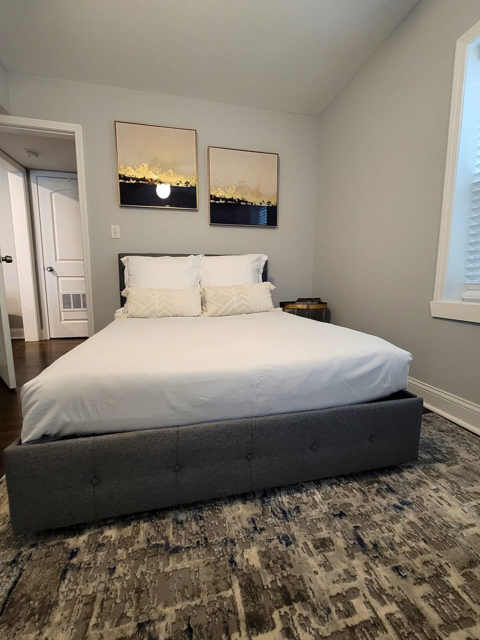 New Full size upholstered bed with under-mount drawers for clothing storage