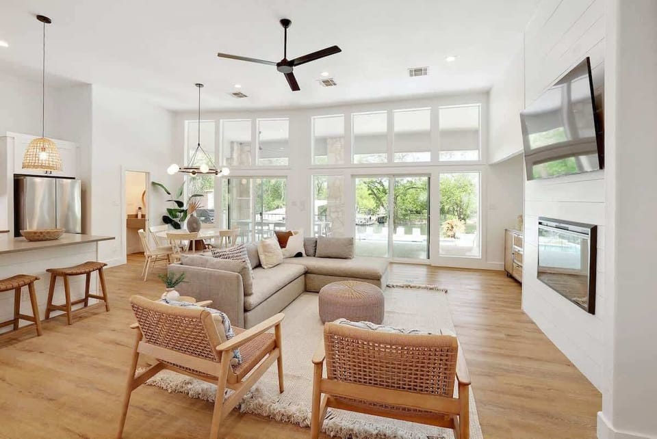 This home’s open concept living area and kitchen is perfect for entertaining.