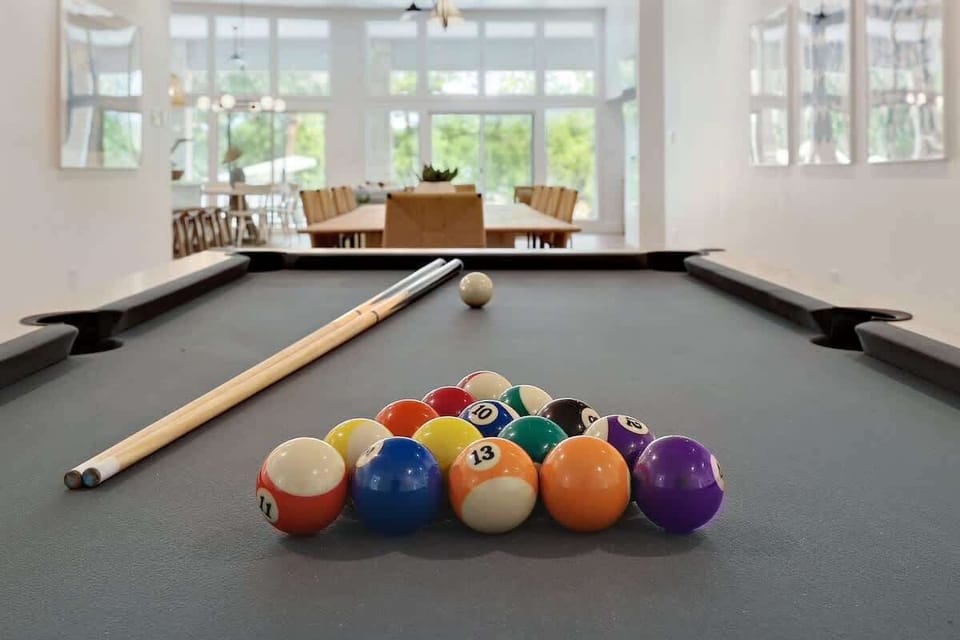 Just past the dining area is the pool table.