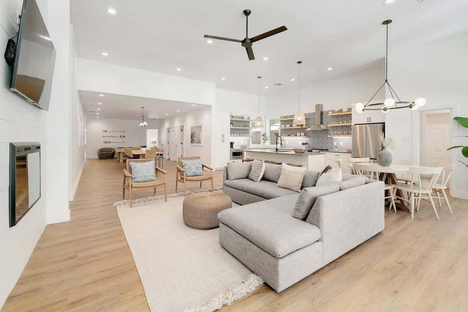 Experience the ultimate lake-side getaway at this expansive single story farmhouse with seven bedrooms on the open water of Lake LBJ. 