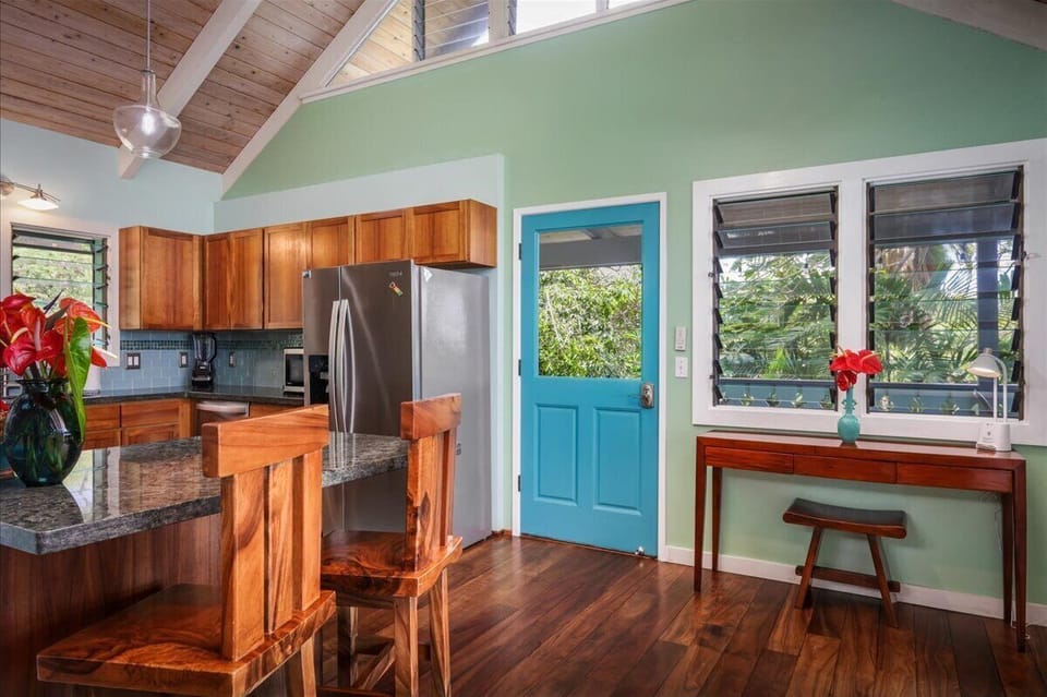 Enter your beach paradise & enjoy the desk area on the right of this door. 