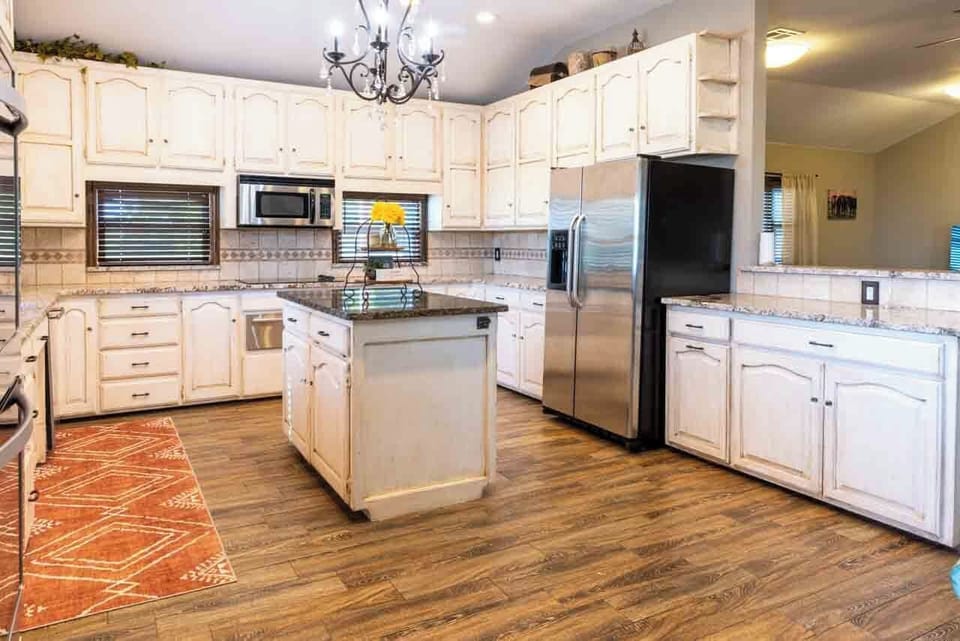 New appliances including fridge, dishwasher, warming drawer, stove, double oven