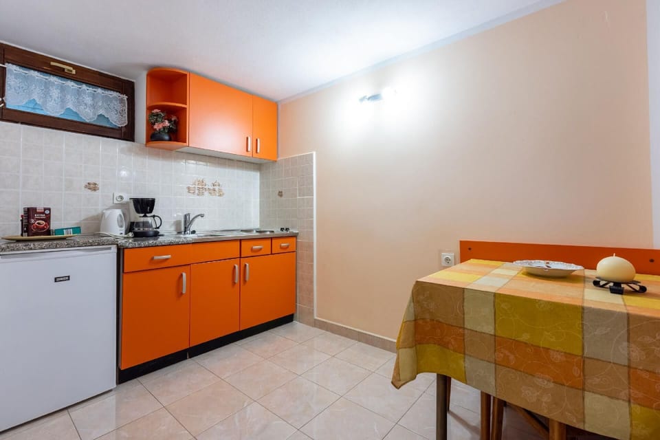 Kitchen area. Small kitchen with dining area