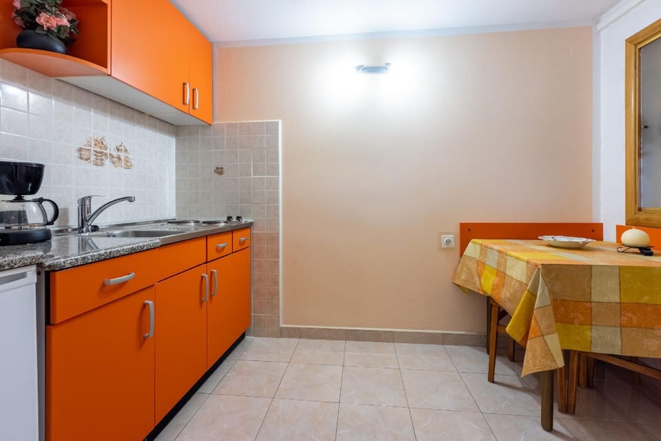 Kitchen area. Small kitchen with dining area