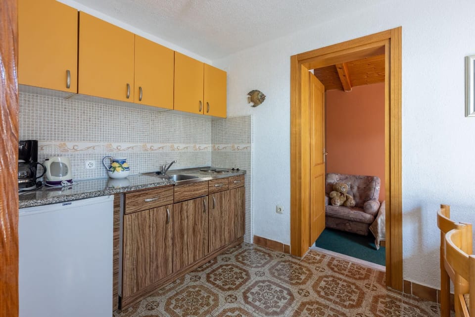 Kitchen area. Small kitchen with dining area