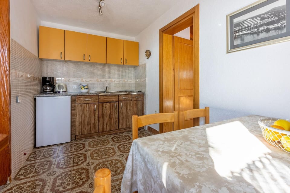 Kitchen area. Small kitchen with dining area