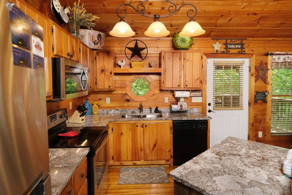 View of kitchen and door to back porch - View of kitchen and door to back porch