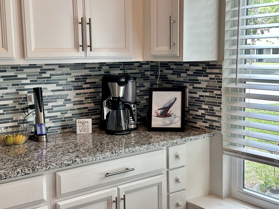Ninja coffee bar and electric wine opener.