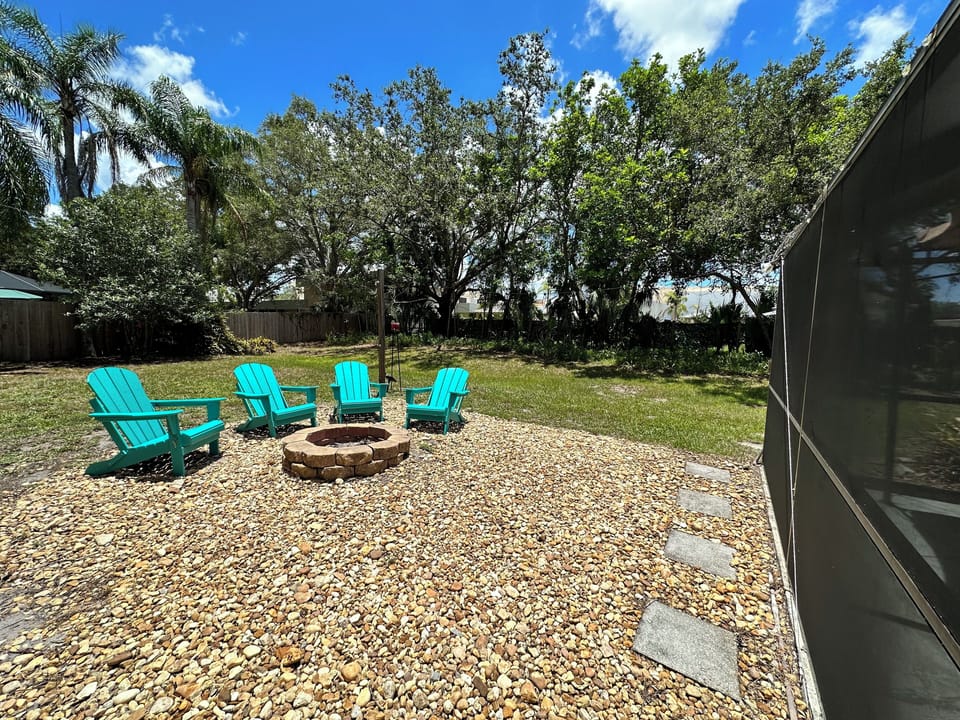 Fire pit and plenty of space to set up corn hole boards (provided).
