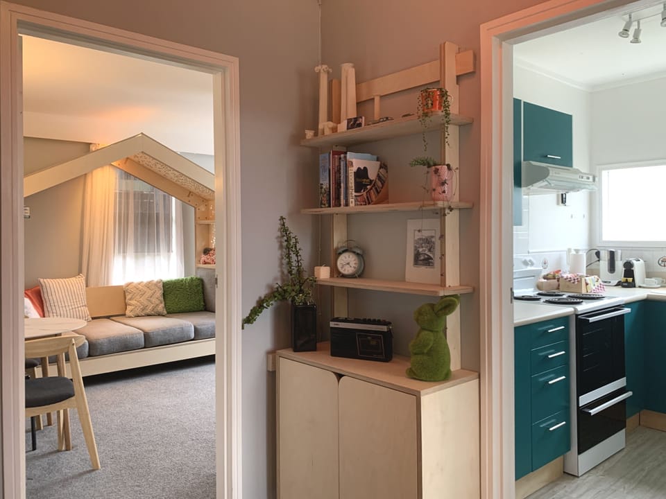 The living room and kitchen meet.