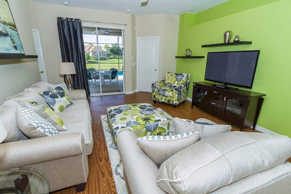 Family Room with Patio Door access to the Lanai/Pool Deck