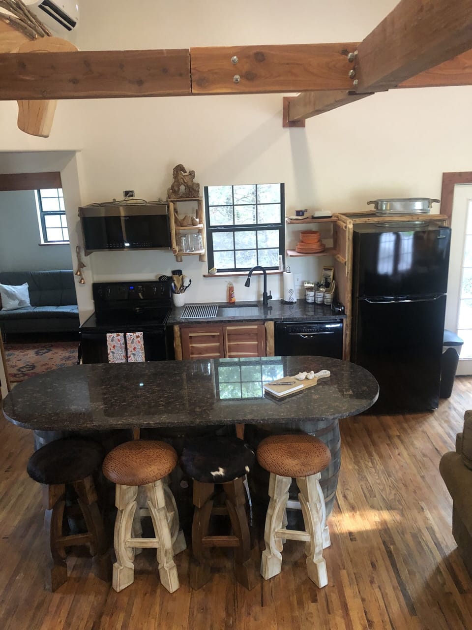 Kitchen includes full size range, refrigerator, dishwasher and microwave.