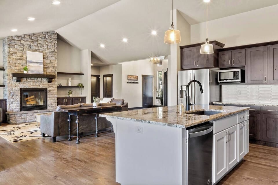 15. Full Kitchen with stainless steel dishwasher,  and deep sink with garbage disposal.