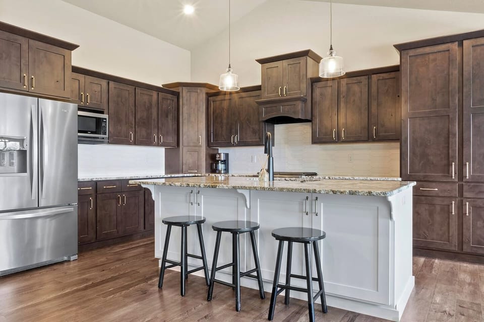 13. Full Kitchen with large stainless steel double-door refrigerator