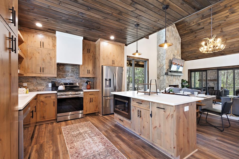 Stainless Appliances and Kitchen Island with Bar Seating