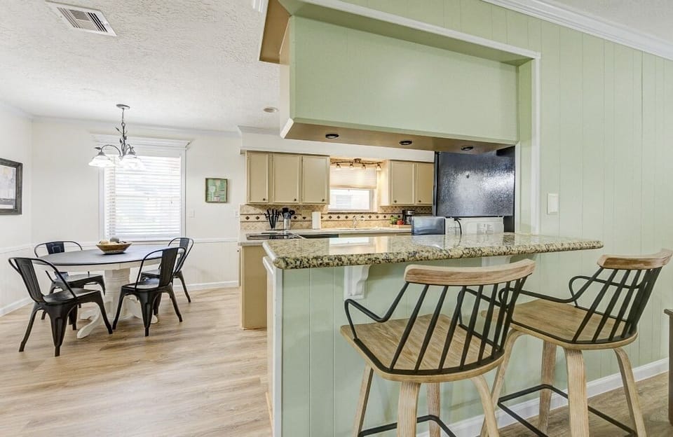 This barstool seating provide a great view to the kitchen or living room.