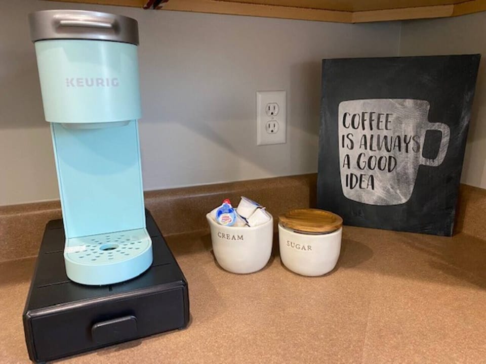 Channel your inner barista in our modern kitchen, complete with a Keurig and Cuisinart drip coffee maker.
