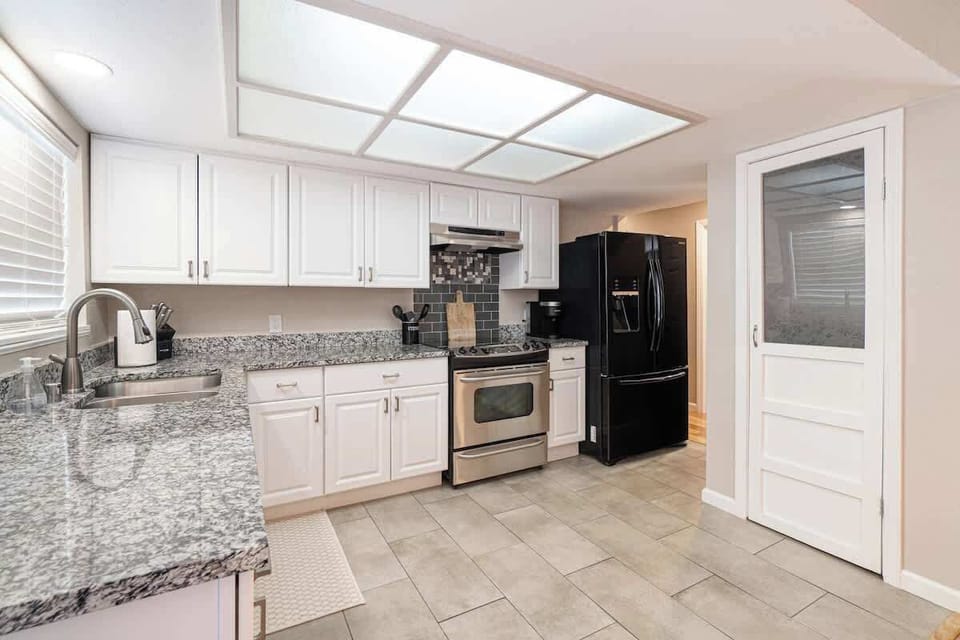 Fully stocked kitchen.
Keurig coffee bar with complimentary coffee.
Large Fridge.