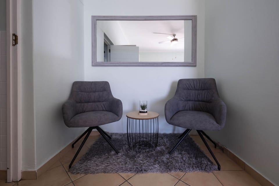 A seating area in the bedroom