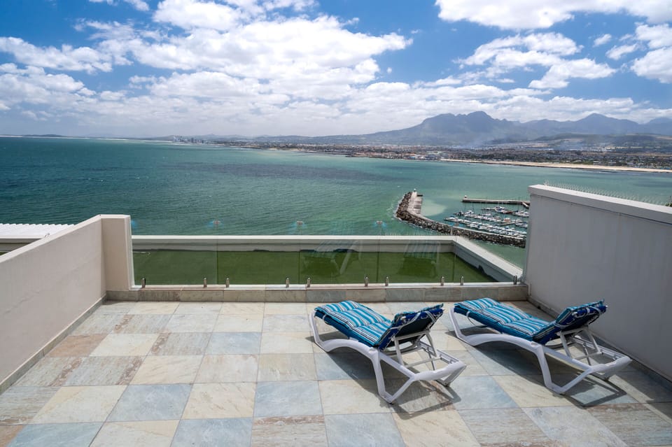 The patio with lounge chairs to look at the view