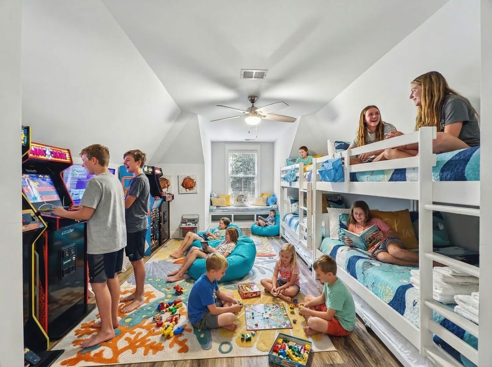 Fun and spacious bunk room with arcades designed for kids and teens in this family-friendly Hilton Head rental!