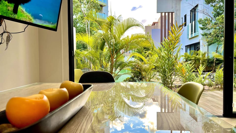 "Modern Kitchen with Glass Table: Stylish Elegance"