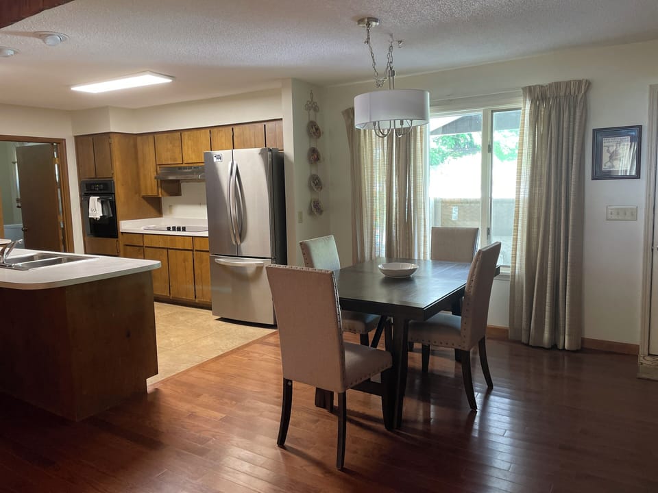 View of Dining Area & Kitchen