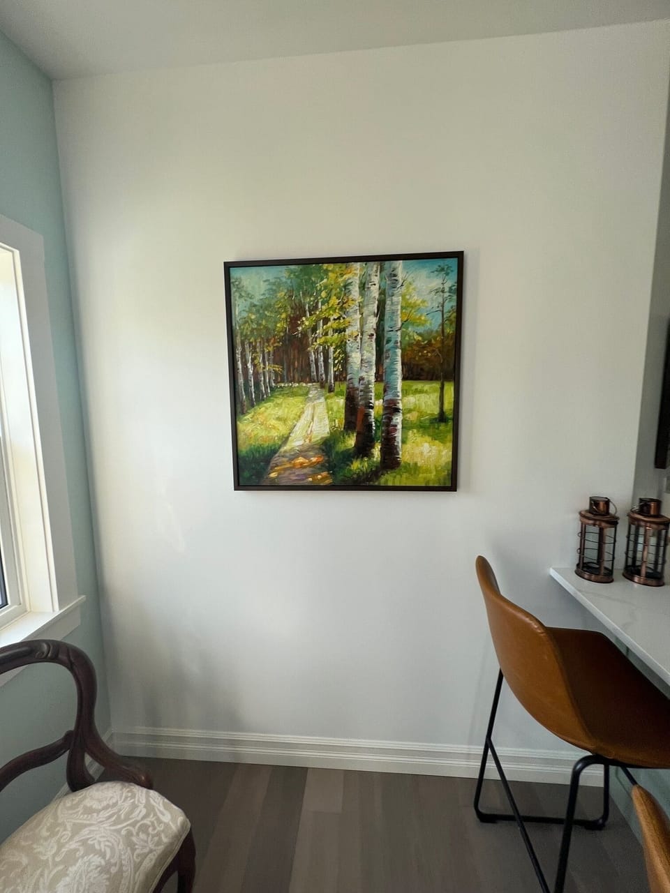 Artwork adorns the walls with a variety of artists.