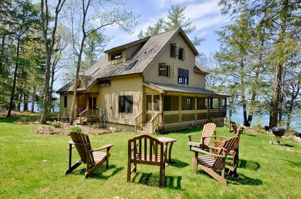 Back of house looking north to St. Lawrence Seaway where freighters pass.