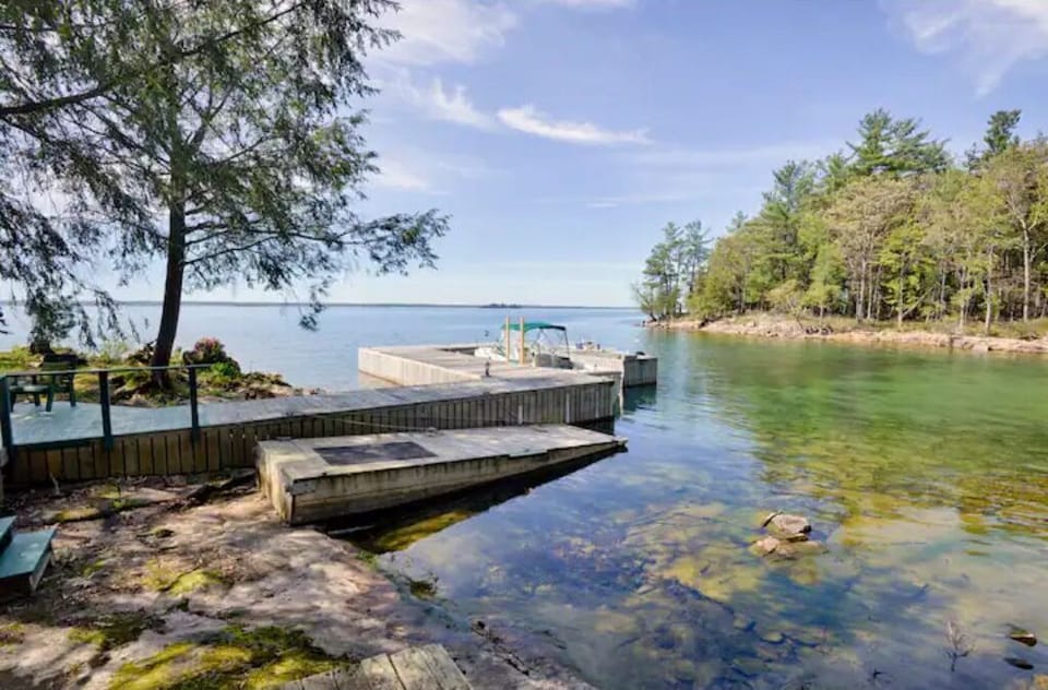 Dock and slips for three boats; private swimming cove.