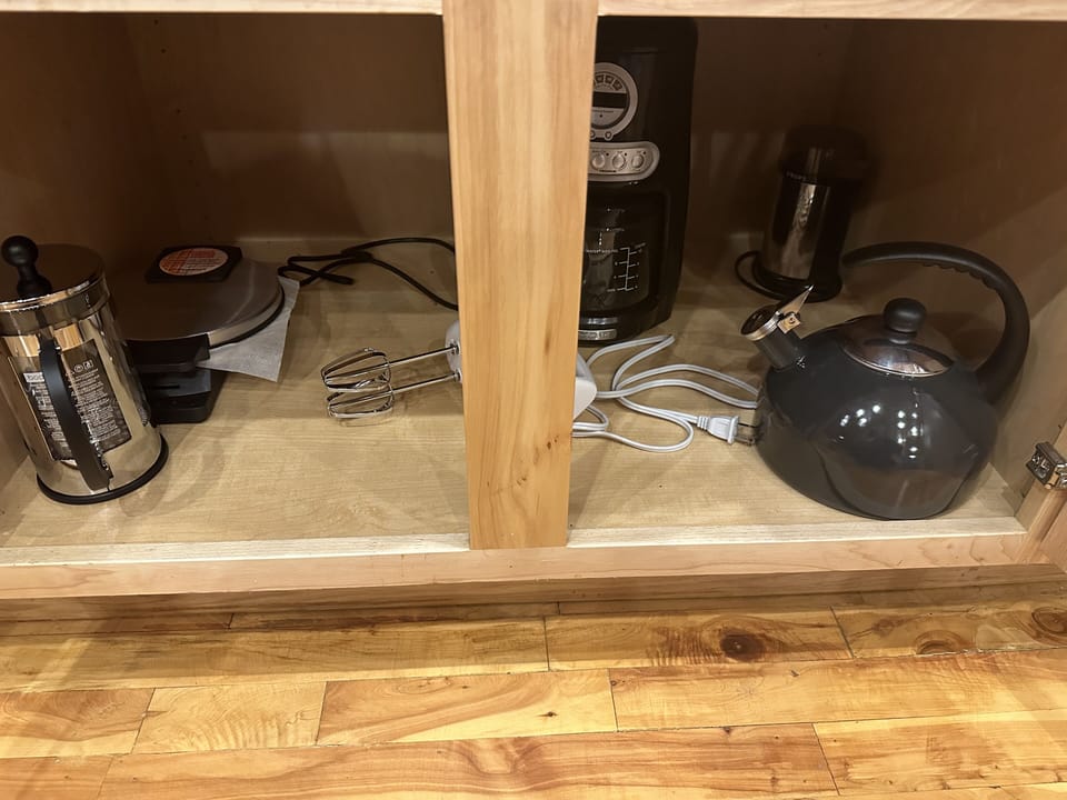 French press, drip coffee pots, kettles, mixer, waffle maker, coffee grinders. 