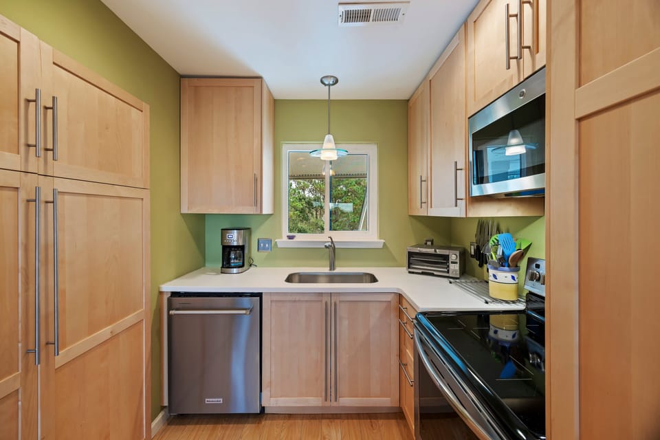 Fully Equipped Kitchen with everything you need and stainless appliances.