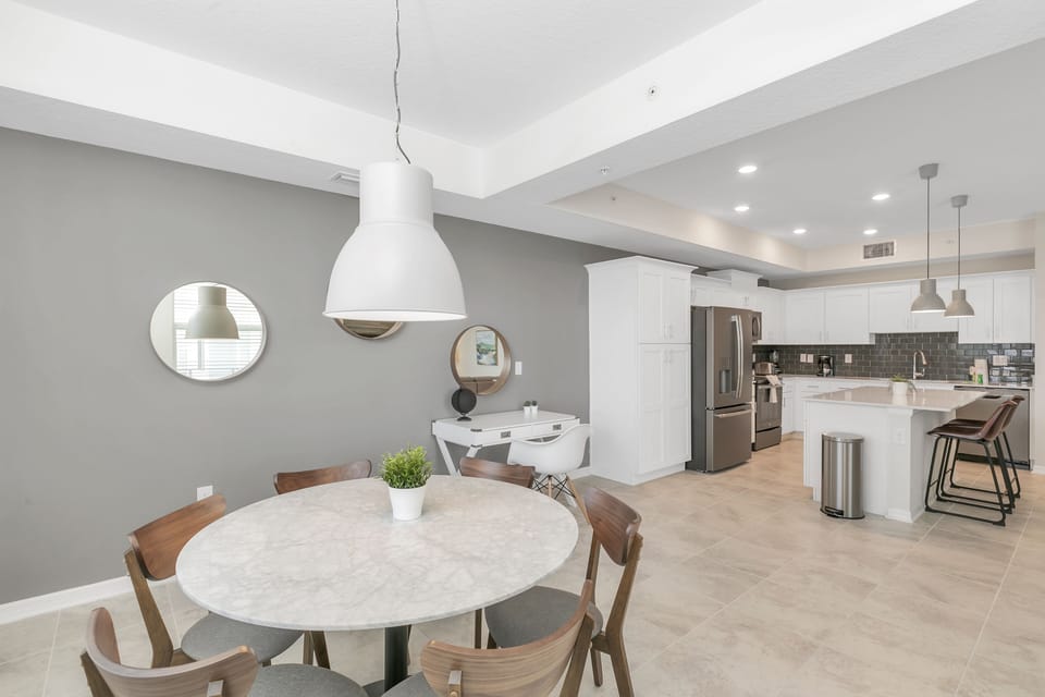 The condo features a modern, open-concept layout with plenty of natural light.