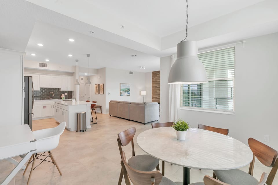 The condo features a modern, open-concept layout with plenty of natural light.