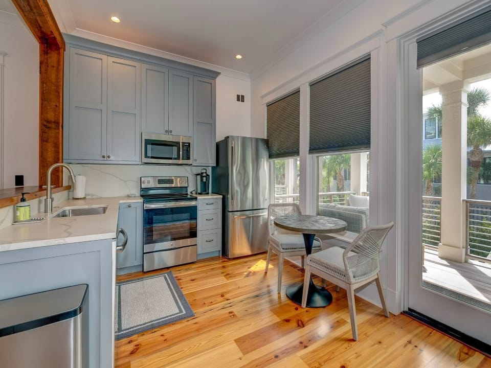 Full Kitchen, living room, porch and pool access,  two bedrooms (bunk room and King) each with ensuite bathrooms and Laundry Closet with washer and dryer.