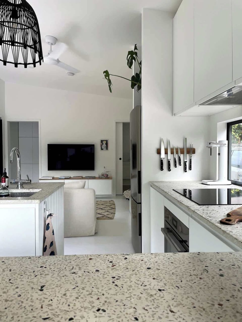 Kitchen and open plan living room TV