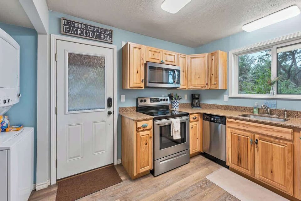 Fully equipped with everything you need for the week including glass cooktop range, microwave, dishwasher, small appliances and refrigerator.